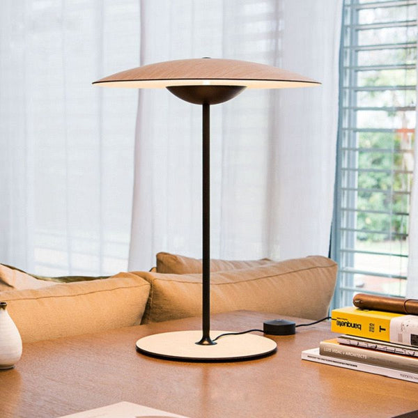 Ginger wood table lamp on a side table