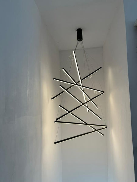 9x100 LED Line Chandelier mounted on a Nigerian ceiling