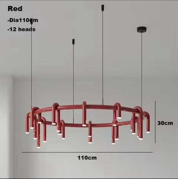 Lustre red tube chandelier illuminated in a living room