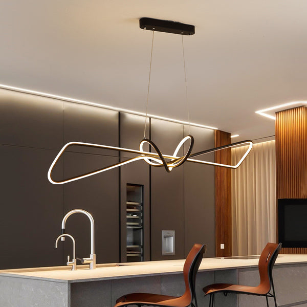 Bowtie LED Island Light illuminated above a dining table in Nigeria