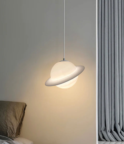 Saturn Pendant Light hanging in a Nigerian bedroom