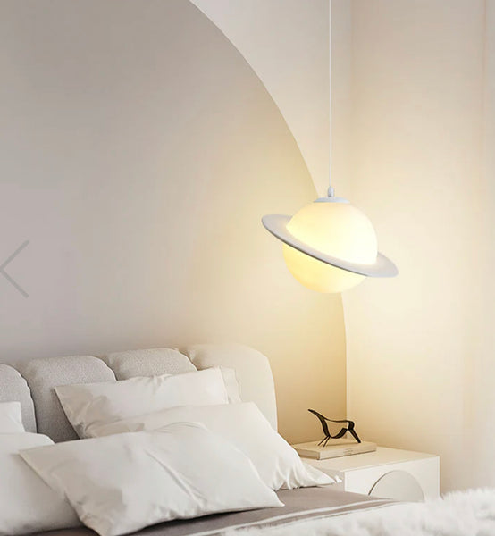 Saturn Pendant Light illuminated in a Nigerian office reception