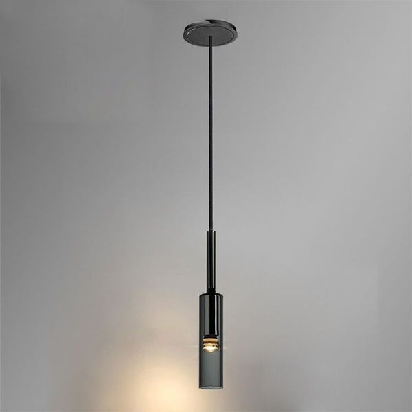 Winery Glass Droplight hanging above a kitchen island in Nigeria