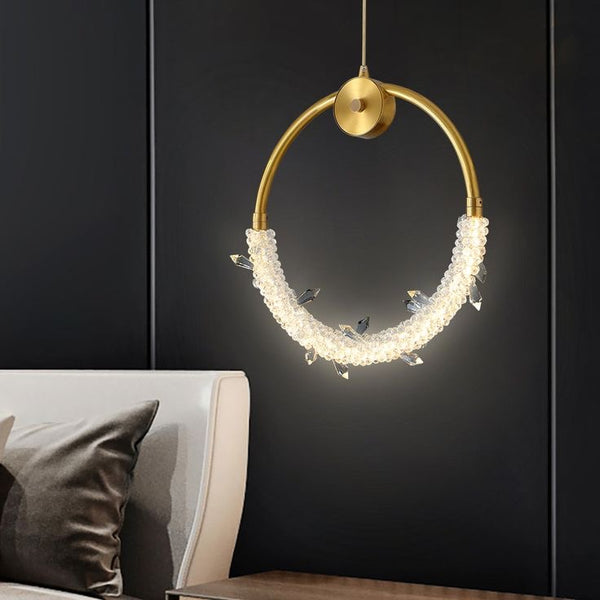 Crystal Ring Pendant Light illuminated in a Nigerian bedroom