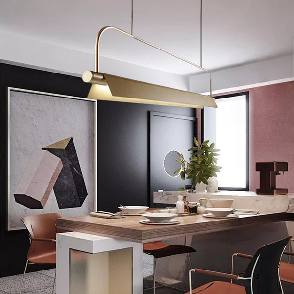 Kramer gold long chandelier in a modern living room