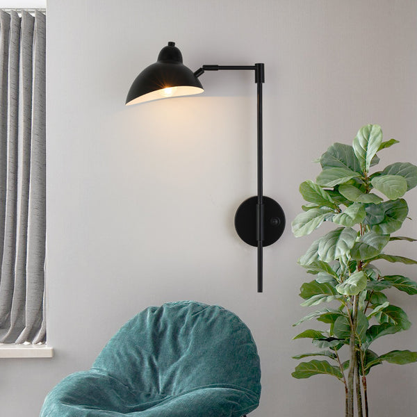 Double Swing Pole Wall Light with adjustable swing arms mounted above a bed in Nigeria