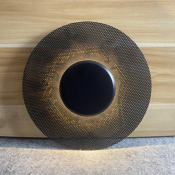 Keller wall light illuminated with warm glow