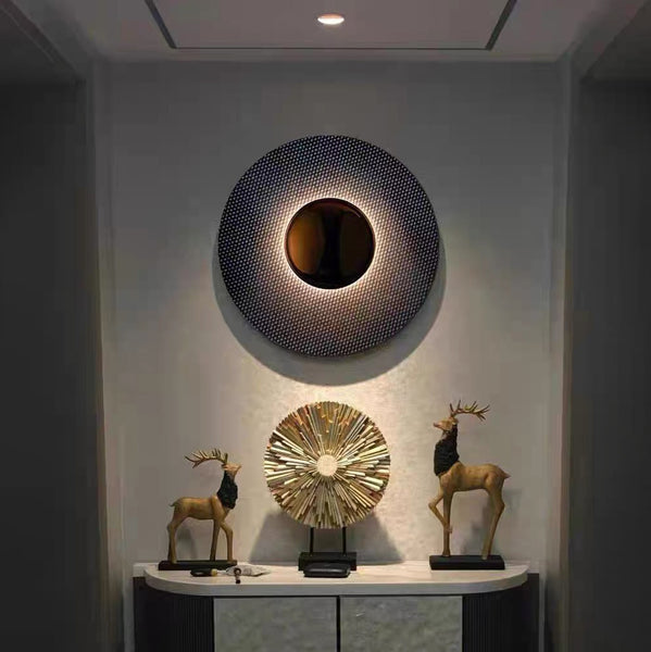 Keller black round wall light mounted on a wall