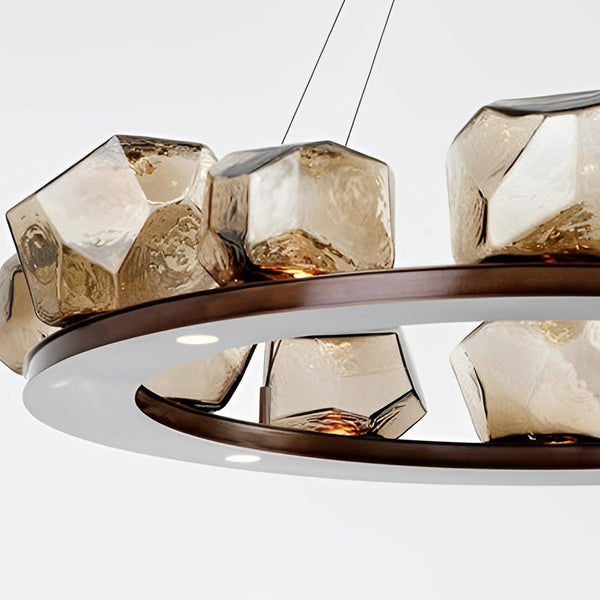 Diamond Cut Round Glass Chandelier illuminated above a dining table in Nigeria