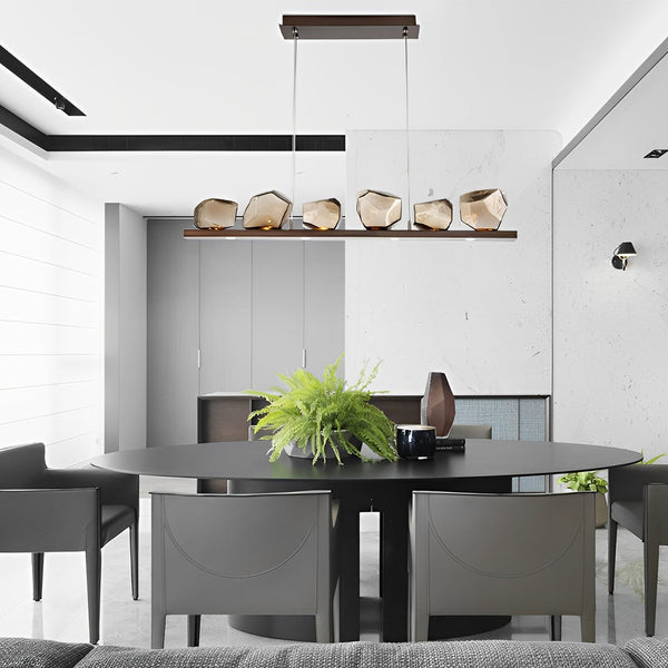 Diamond-cut chandelier illuminated in a dining room