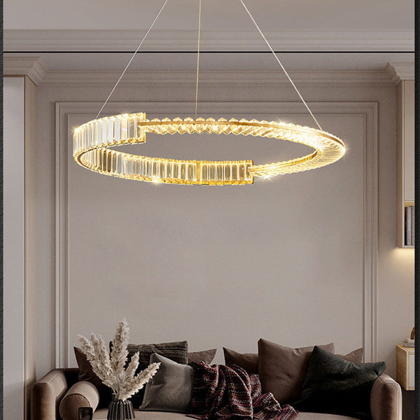Citrus crystal chandelier illuminated in a living room