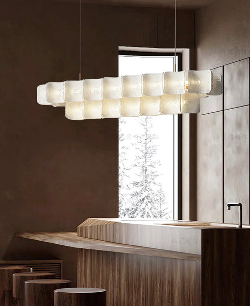 Vitre rectangle chandelier illuminated in a dining room