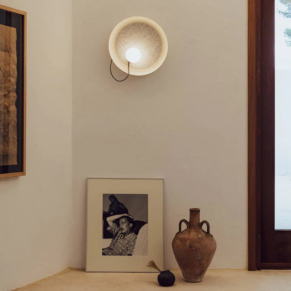 Acoustic Disc white wall light illuminated