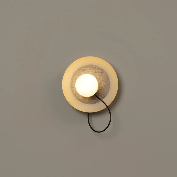 Acoustic Disc white wall light in a hallway