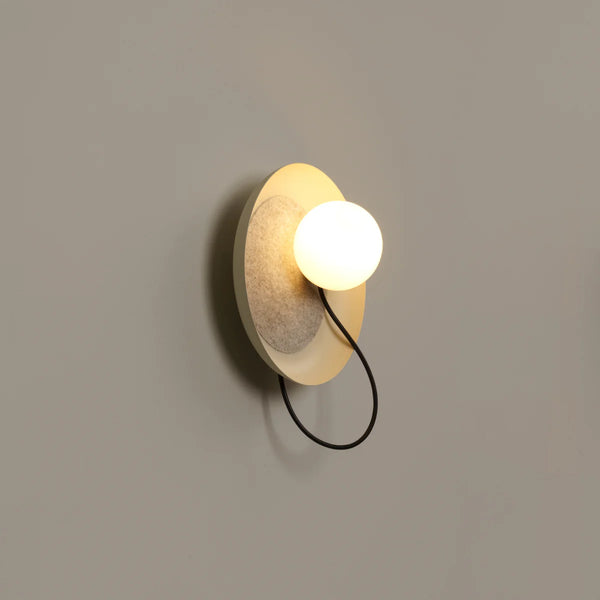 Acoustic Disc white wall light in a living room setting