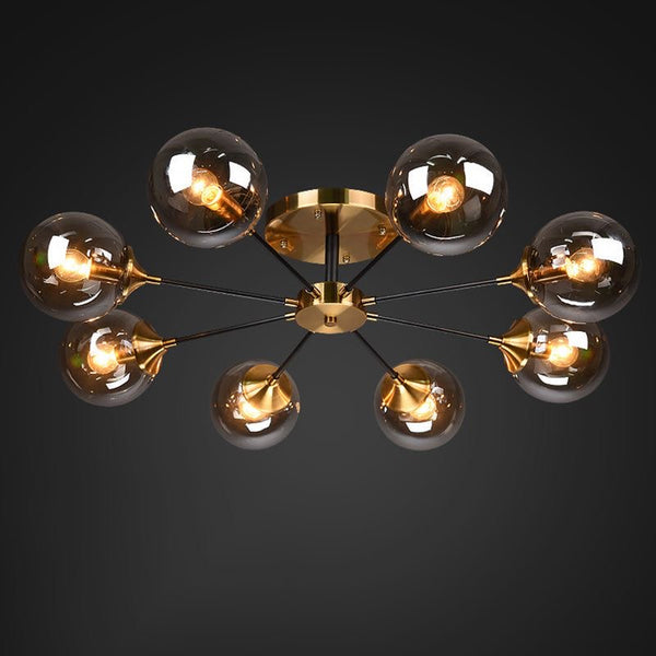Molecular 8-Head Chandelier illuminated above a dining table in Nigeria
