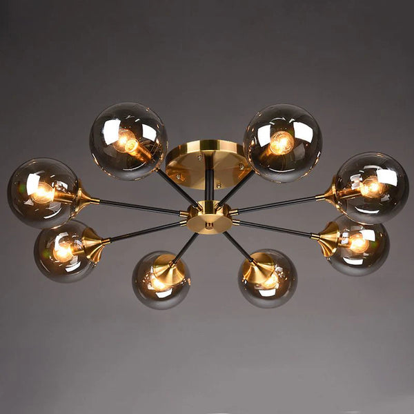 Molecular 8-Head Chandelier in copper hanging in a Nigerian living room