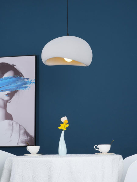 Wabi-Sabi grey resin light illuminated in a living room