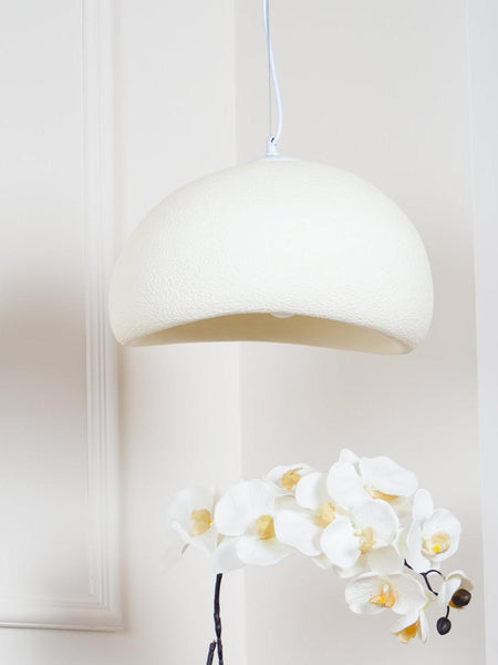 Close-up of Wabi-Sabi white resin light's oval texture