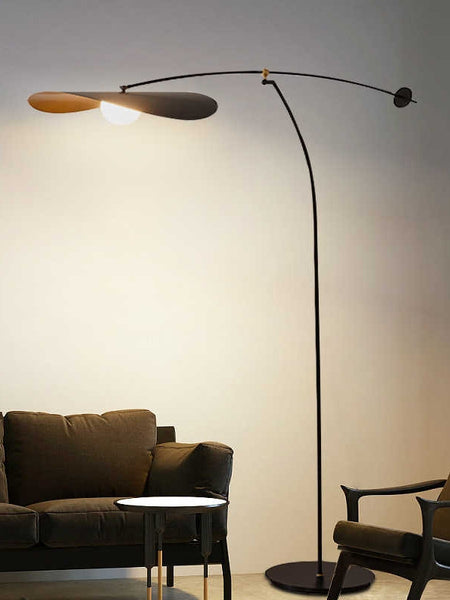 Alonso arc floor lamp in a living room corner