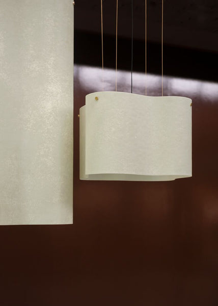 Close-up of Nuvola pendant's sheepskin texture