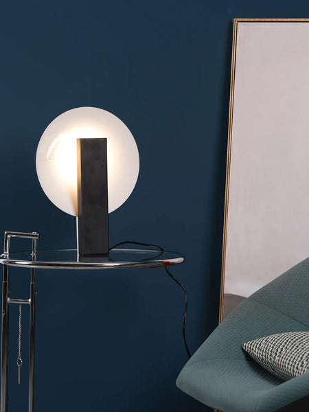 Orbe black lamp shown from a side angle