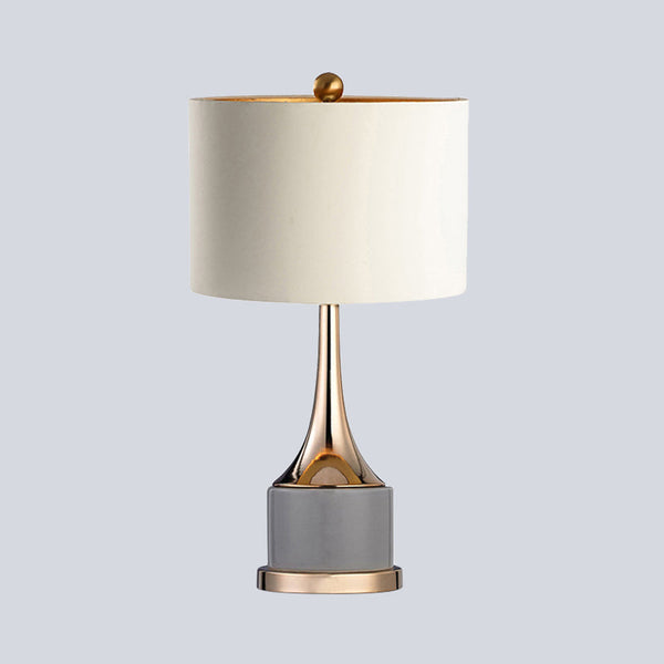 Grey Top Table Lamp with marble base on a Nigerian side table
