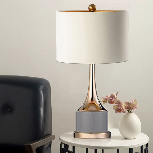 Grey Top Table Lamp illuminated in a Nigerian bedroom
