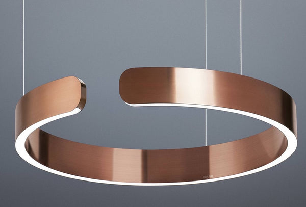 Modern Web Chandelier in rosegold hanging in a Nigerian living room