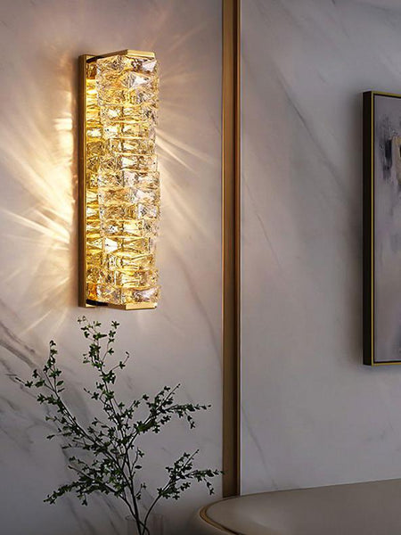Regency Crystal Wall Light in gold mounted on a Nigerian living room wall