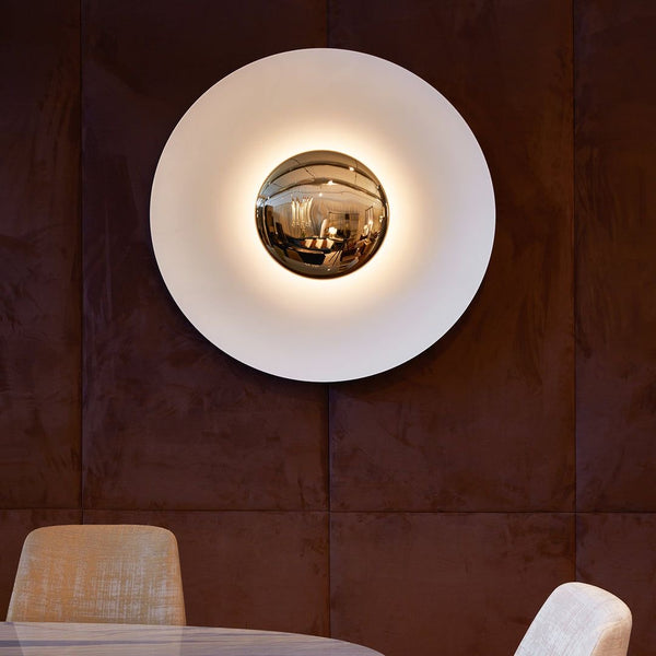 Vintage Oval Wall Light mounted on a Nigerian living room wall