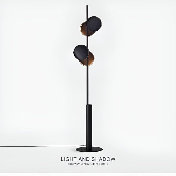 Light and Shadow Standing Lamp illuminated in a Nigerian office