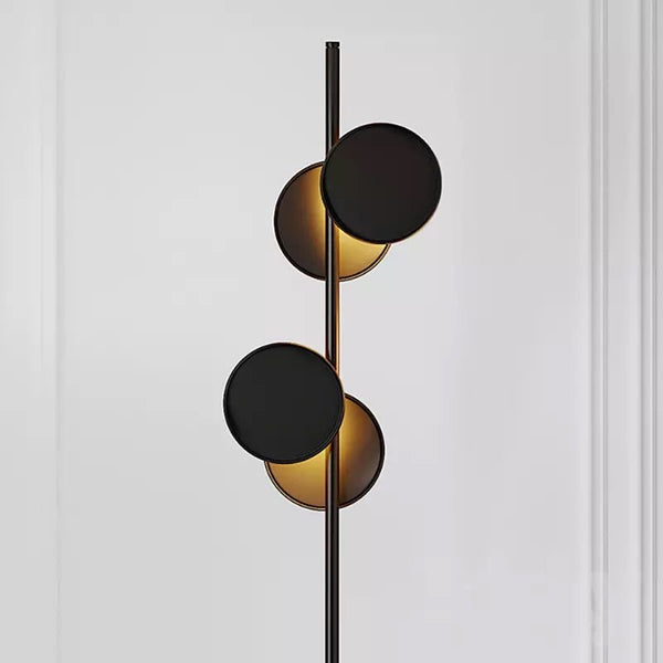 Close-up of Light and Shadow Standing Lamp showing round geometric base