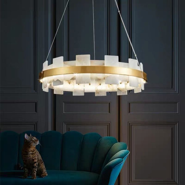 Close-up of Rock Marble chandelier's brass and marble finish