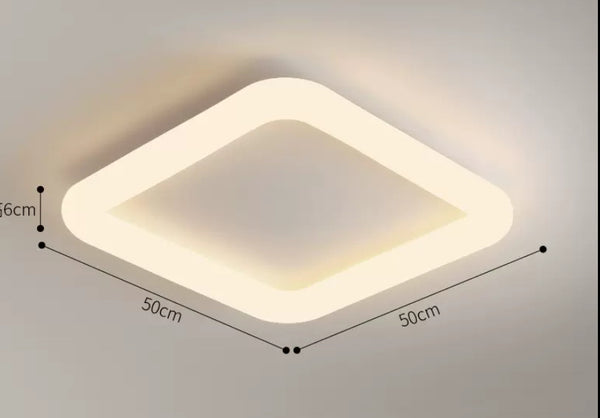 Square Ring Ceiling Light illuminated in a Nigerian bedroom