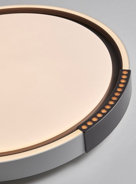 Close-up of Round Chic Flush Light showing grey and black finish