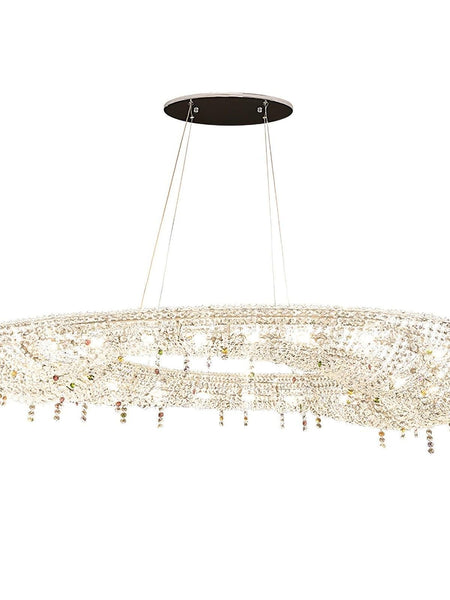 Oval crystal chandelier with sleek metal frame in a dining room