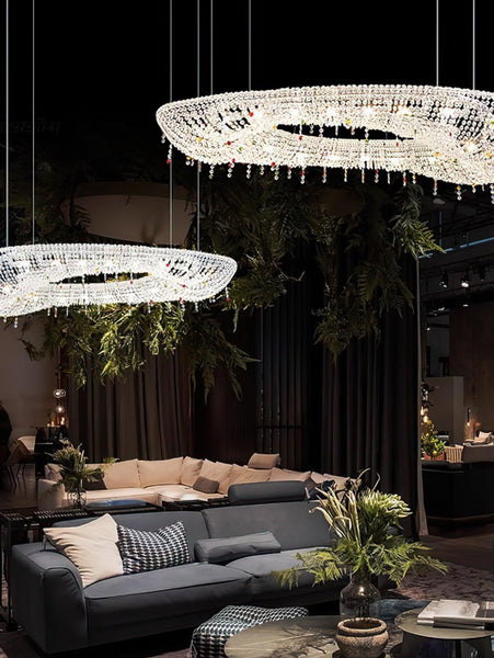 Oval crystal chandelier hanging in a living room