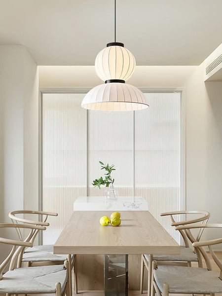 Mulberry Silkworm pendant light hanging in a bedroom