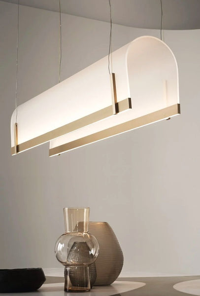 Close-up of Baxter Chandelier showing arched metal and acrylic detail