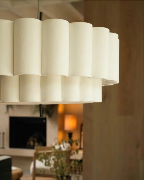 Close-up of Folia Ripple Chandelier showing scalloped linen texture