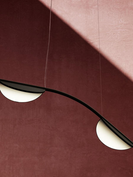 Almendra Arc Suspension Light close-up showing integrated LED edge lighting