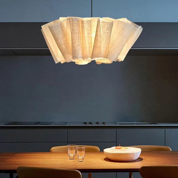 Wabi Sabi cream fabric chandelier hanging in a living room
