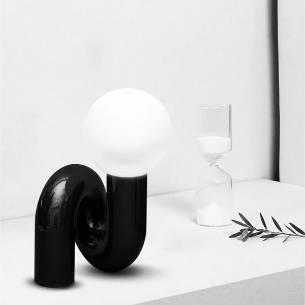 Close-up of Tubular Neotenic Black Table Lamp showing tubular black finish