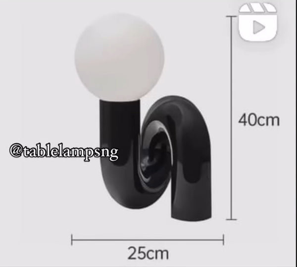 Tubular Neotenic Black Table Lamp paired with modern decor in Lagos