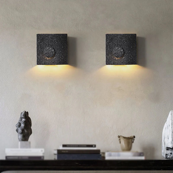 Cave stone wall light in black finish