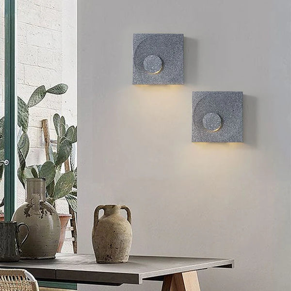 Cave stone wall light in grey, mounted outdoors