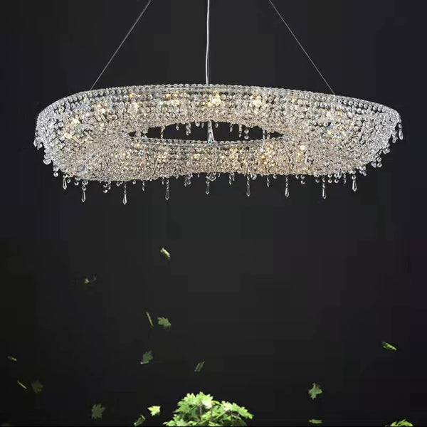 Atoll crystal chandelier with K9 crystals and oval design in a foyer