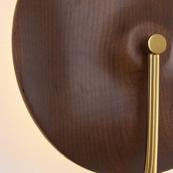 Close-up of solid wood wall light showing natural wood grain