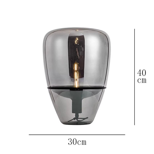 Brokis Balloon black lamp illuminated on a side table
